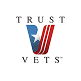 Trust Vets logo featuring a stylized 'V' with a star and red stripes.